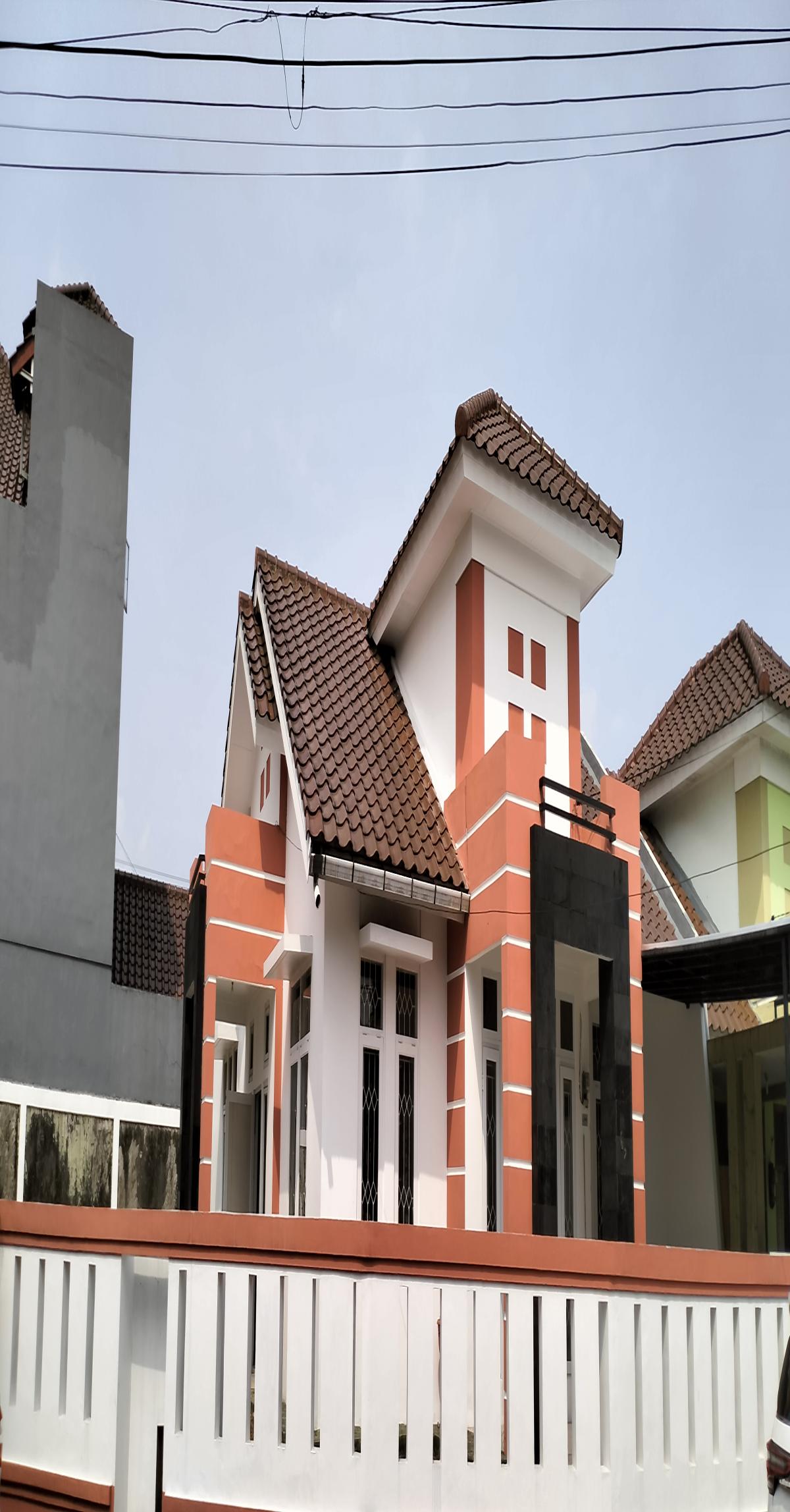 Rumah Asri Minimalis Dengan Taman Luas Hook Dalam Cluster Perumahan Taman Yasmin Sektor 7