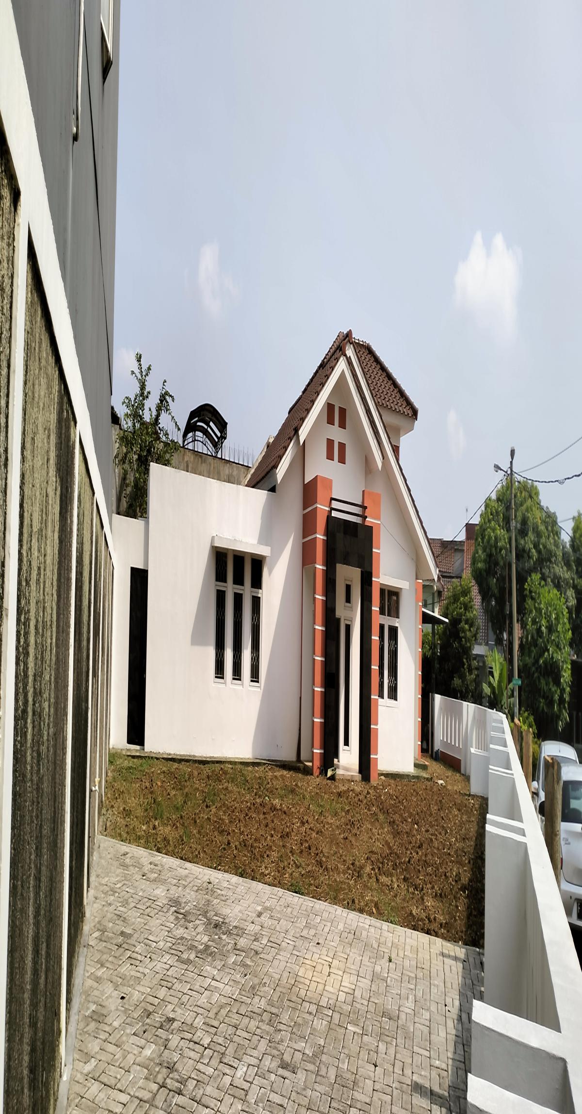 Rumah Asri Minimalis Dengan Taman Luas Hook Dalam Cluster Perumahan Taman Yasmin Sektor 7 - Foto 2